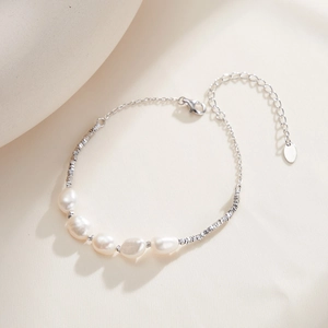 Detailed view of S925 sterling silver bracelet with five irregular freshwater pearls