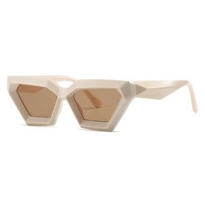 Irregular geometric cream sunglasses with brown lenses in a side view profile