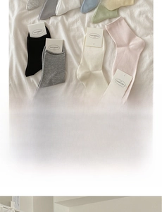 Close-up of pastel cotton socks showing material details and color palette options