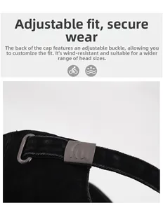 Close-up of adjustable metal buckle on vintage washed black cotton baseball cap