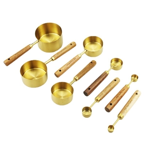 8-piece gold stainless steel measuring cups and spoons set with acacia wood handles