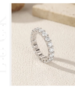 Macro shot of S925 sterling silver eternity ring with sparkling moissanite stones