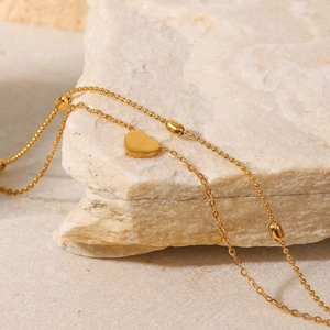 Double-layer 18K gold plated heart pendant anklet with bead chain on a natural stone