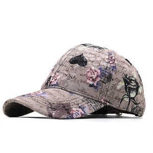 Vintage cotton baseball cap with lace floral print and pink rose details for women