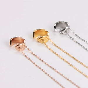 Three elegant C-shape cuff earrings with crystal stones and tassels in gold, rose gold, silver