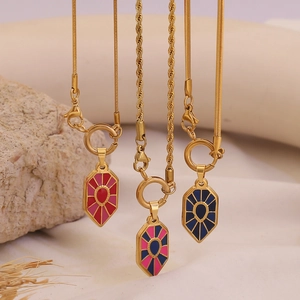 Retro gold stainless steel necklaces with colorful enamel shield pendants on stone base