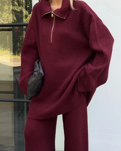 Deep red knit set featuring a half-zip sweater and wide-leg trousers for casual style