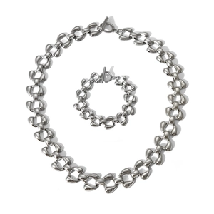 Polished stainless steel jewelry set with bold interlocking links and toggle clasp