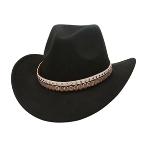 Detail of western cowboy hat with silver star studs and brown leather layered band