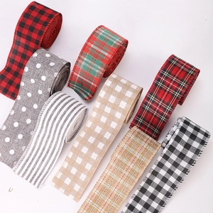 Eight rolls of 6cm Christmas burlap ribbons with various plaid and polka dot patterns