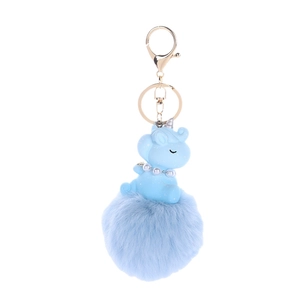 Blue unicorn plush ball keychain with golden ring and pearl necklace accessory