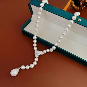 Elegant pearl necklace with leaf zircon pendant and drop pearl in a luxury gift box