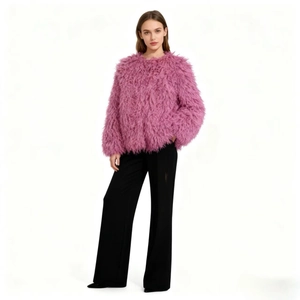 Pink faux fur coat with fluffy long pile texture and minimalist round neck design