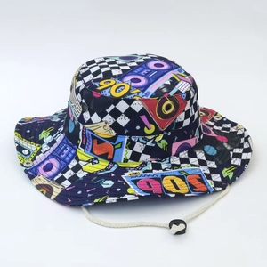Detail of 90s vintage pop art print bucket hat with adjustable white chin strap and cord lock