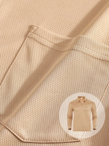 Macro detail of breathable knitted fabric and chest pocket on khaki tactical polo shirt
