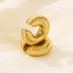 Golden hollow C-shape croissant dome earrings with a textured spiral screw design