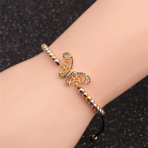 Detail view of butterfly charm bracelet with colorful zircons on adjustable black cord