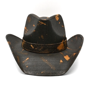 Close-up of black western cowboy hat with vintage distressed orange-brown textured finish