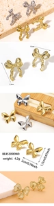 Detailed macro view showing dimensions and 14K gold plated butterfly stud earrings