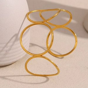 Detailed view of intertwined 18K gold plated minimalist open circular bangle rings
