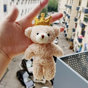 Mini cream plush teddy bear keychain with golden crown and silver bead chain accessory