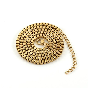 Golden stainless steel box chain necklace with lobster clasp on a white background