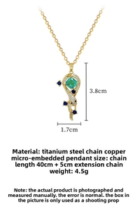 Detail of snake necklace with green gemstone and micro-pave crystals on titanium steel chain