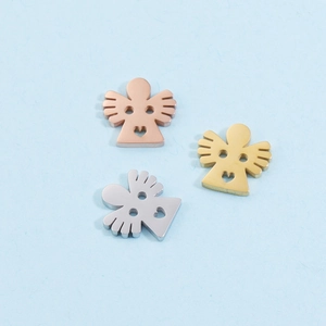 Detailed view of angel-shaped metal charms in rose gold, gold, and silver finishes