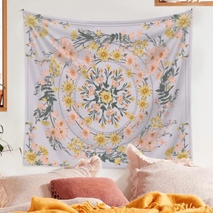 Detailed view of a purple mandala tapestry with yellow floral patterns in a cozy bedroom