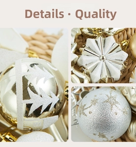 Close-up of festive gold and silver Christmas ornaments with glittery snowflake patterns
