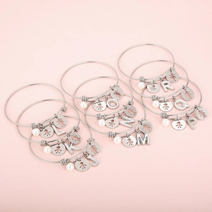 Adjustable stainless steel bracelets with alphabet charms, silhouettes and pearls