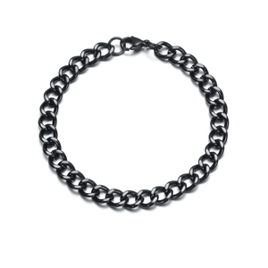 Detailed close-up of a classic black stainless steel Cuban chain bracelet on white background