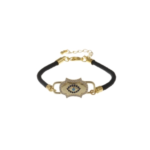Detail of adjustable evil eye bracelet with gold-plated charm and cubic zirconia stones