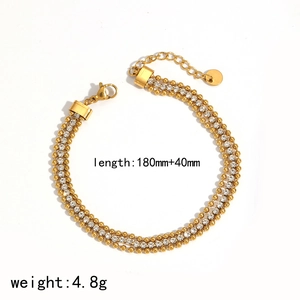 Bracelet triple chaîne en acier inoxydable doré orné de zircons cubiques scintillants