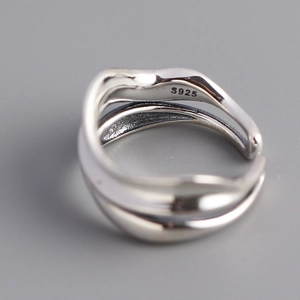 Detail showing S925 hallmark on a double-layer irregular wavy sterling silver ring