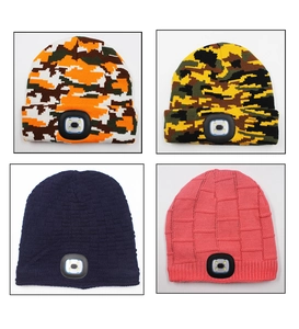 Detailed view of knitted LED beanies in camouflage and checkered patterns with light