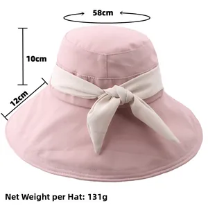 Dimensioni del cappello parasole rosa con tesa da 12 cm e fiocco beige decorativo
