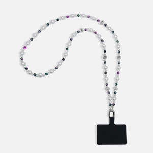 Detail of beaded mobile strap with faux pearls, colorful beads and floral metal accents