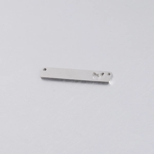 Macro view of silver rectangle hollow butterfly pendant with dual holes in titanium steel