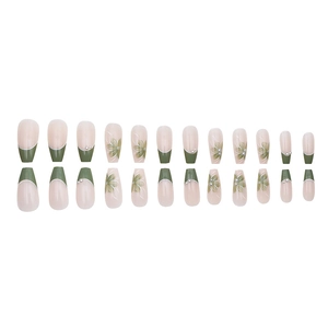 Long ballerina press-on nails with green floral patterns and pearl accents on 24 piece set