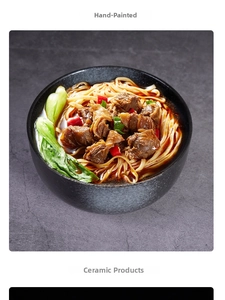 Macro shot of large black ceramic noodle bowl with textured finish and fresh beef ramen
