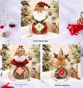 Detail of Christmas drawstring gift bags with Santa, snowman and reindeer plaid designs