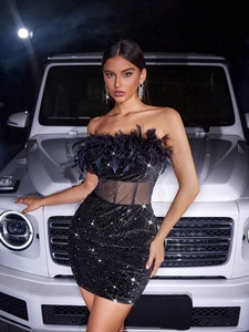 Sexy black sequined tube dress with feather trim and sheer mesh waist panels