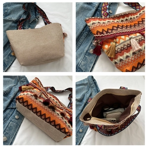 Detail of bohemian tote bag showing colorful woven patterns and spacious inner pocket