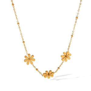Golden stainless steel necklace featuring three sunflower pendants on a white background