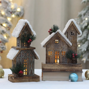 Macro view of wooden Christmas cabin with snow roof and warm interior light accents