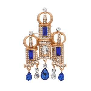 Vintage gold castle brooch with blue rhinestones and dangling crystal pendants