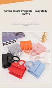 Detailed arrangement of mini silicone jelly handbags in seven vibrant colors on white surface