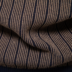 Men's slim fit turtleneck sweater featuring navy and brown vertical ribbed knit texture