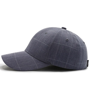 Dark grey windowpane check baseball cap with side metal eyelets and structured canvas texture
